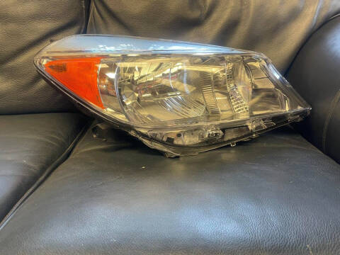 2005 Toyota YARIS HEADLIGHT RIGHT for sale at BENHAM AUTO INC - Peace of Mind Auto Collision and Repair in Lubbock TX