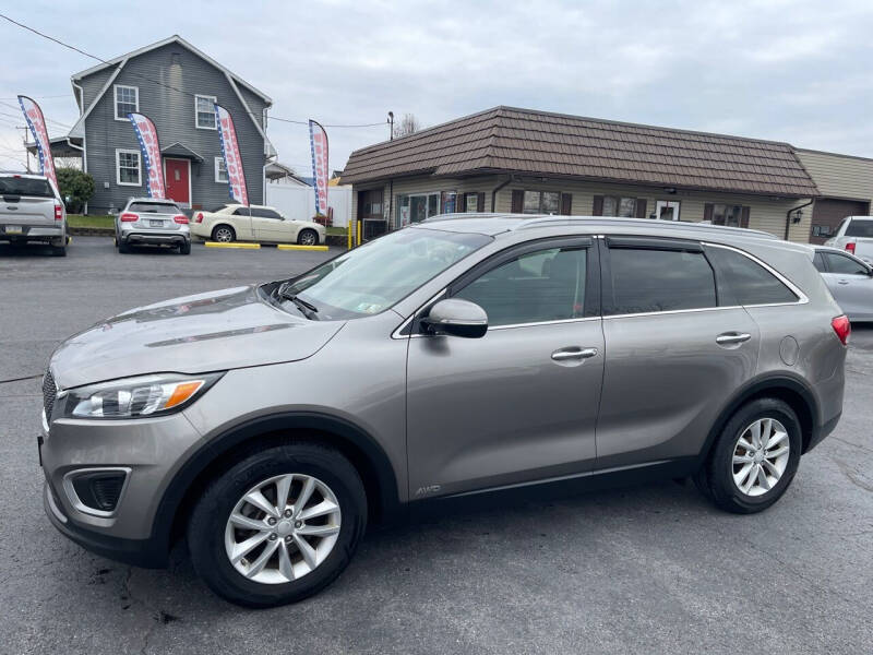 2016 Kia Sorento for sale at MAGNUM MOTORS in Reedsville PA