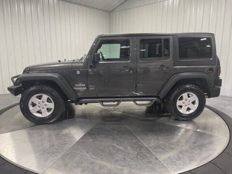 2017 Jeep Wrangler Unlimited for sale at HILAND TOYOTA in Moline IL