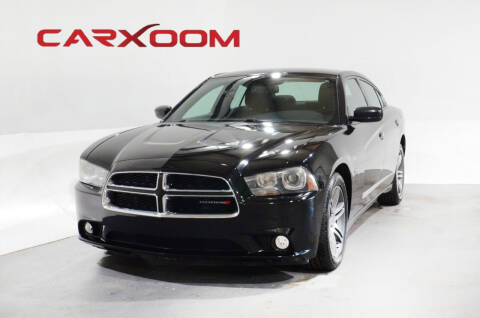 2014 Dodge Charger for sale at CarXoom in Marietta GA