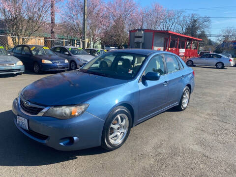 2009 Subaru Impreza for sale at Blue Line Auto Group in Portland OR