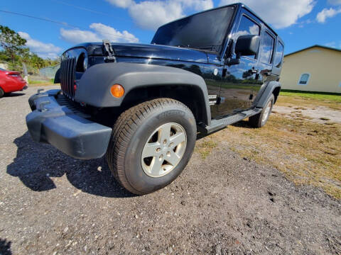2013 Jeep Wrangler Unlimited for sale at Mox Motors in Port Charlotte FL
