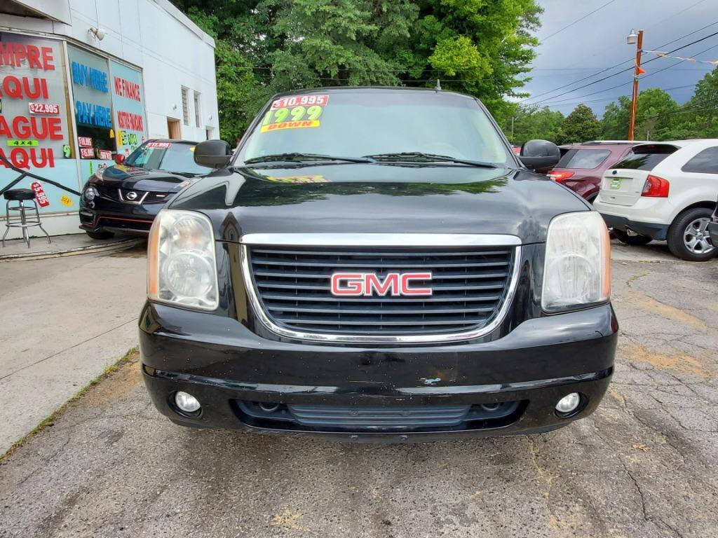 2008 GMC Yukon for sale at DAGO'S AUTO SALES LLC in Dalton, GA