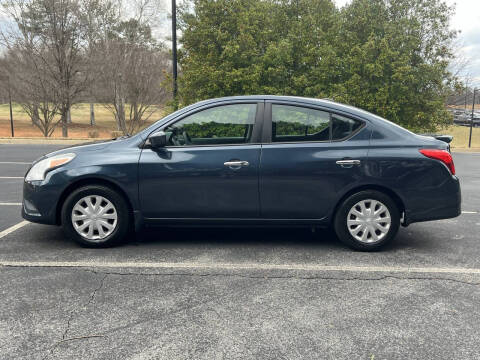 2015 Nissan Versa for sale at FALCONS AUTOMOTIVE LLC in Buford GA