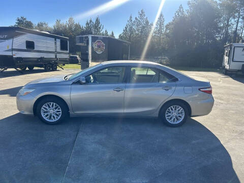 2015 Toyota Camry for sale at VANN'S AUTO MART in Jesup GA