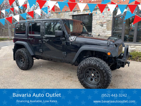 2013 Jeep Wrangler Unlimited for sale at Bavaria Auto Outlet in Victoria MN