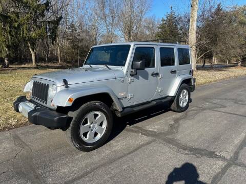 2011 Jeep Wrangler Unlimited for sale at Spooner Auto Sales in Flint MI