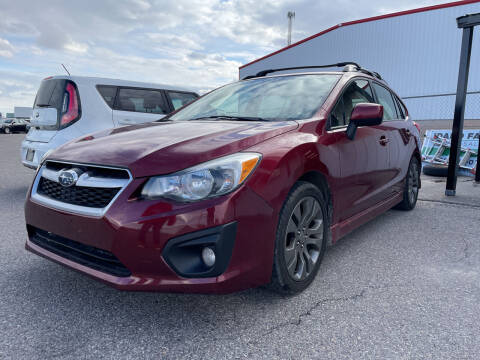 2012 Subaru Impreza for sale at BELOW BOOK AUTO SALES in Idaho Falls ID
