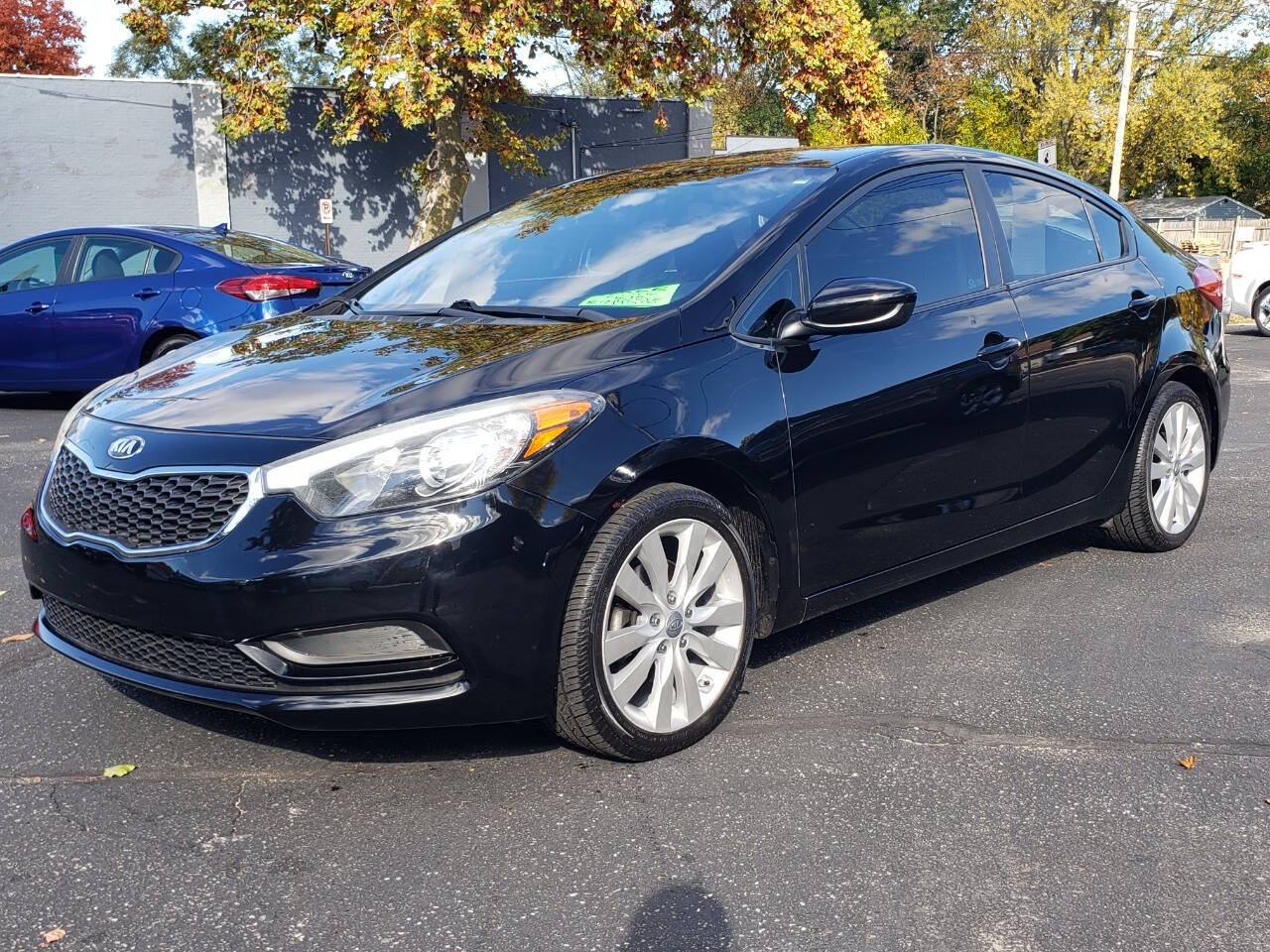 2016 Kia Forte for sale at Auto Shop in Wyoming, MI