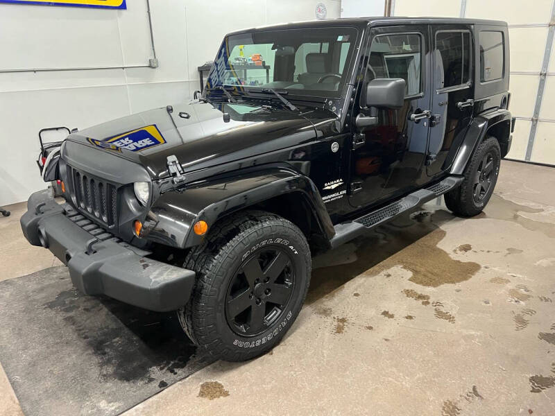 2009 Jeep Wrangler Unlimited for sale at Chase 8 Auto Sales Loves Park in Loves Park IL