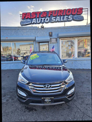 2015 Hyundai Santa Fe Sport for sale at FAST AND FURIOUS AUTO SALES in Newark NJ