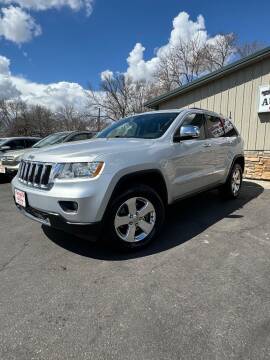 2013 Jeep Grand Cherokee for sale at QS Auto Sales in Sioux Falls SD