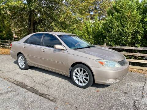 2004 Toyota Camry for sale at Front Porch Motors Inc. in Conyers GA