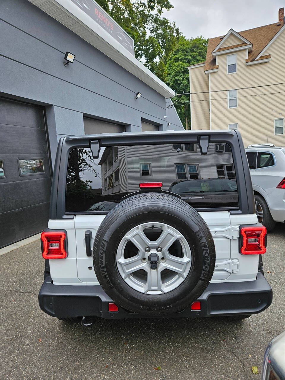 2019 Jeep Wrangler Unlimited for sale at RENOS AUTO SALES LLC in Waterbury, CT