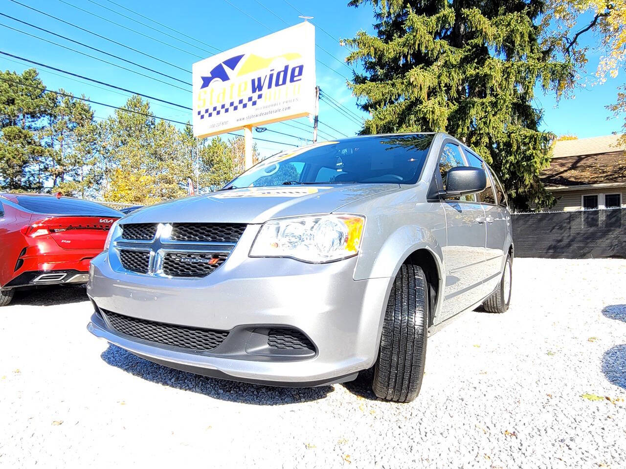 2014 Dodge Grand Caravan for sale at Statewide Auto LLC in Akron, OH