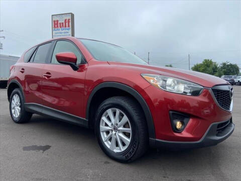 2013 Mazda CX-5 for sale at HUFF AUTO GROUP in Jackson MI