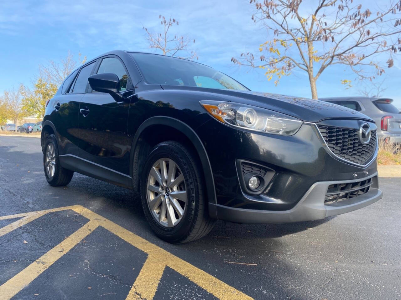 2014 Mazda CX-5 for sale at Ideal Cars LLC in Skokie, IL