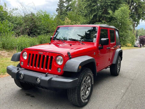 2016 Jeep Wrangler Unlimited for sale at Venture Auto Sales in Puyallup WA