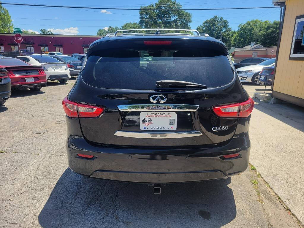 2014 INFINITI QX60 for sale at DAGO'S AUTO SALES LLC in Dalton, GA