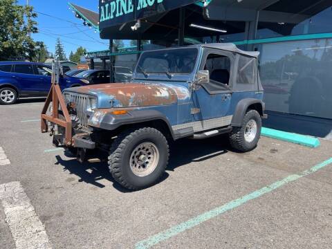 1987 Jeep Wrangler for sale at MERICARS AUTO NW in Milwaukie OR