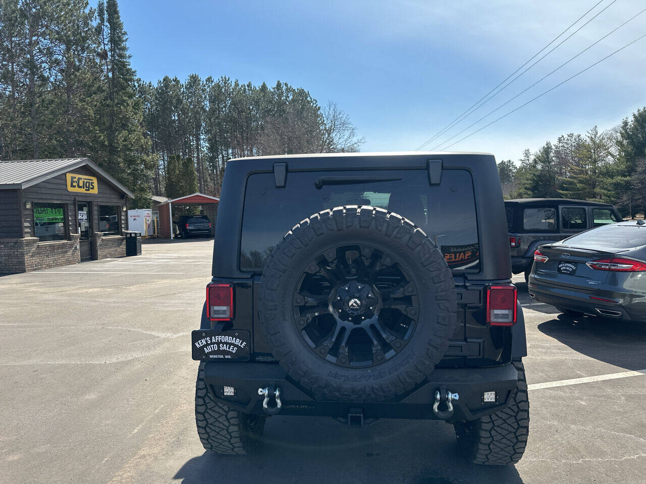 2015 Jeep Wrangler for sale at Auto Hunter in Webster, WI