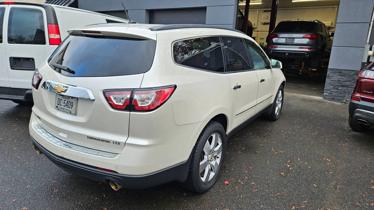 2014 Chevrolet Traverse for sale at RENOS AUTO SALES LLC in Waterbury, CT