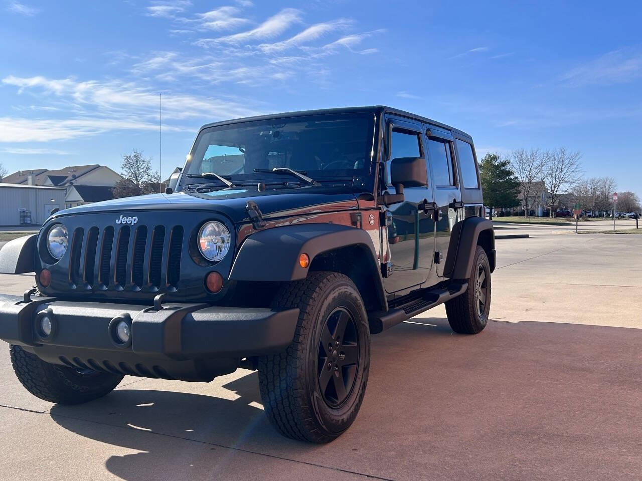 2014 Jeep Wrangler Unlimited for sale at Illinois Auto Wholesalers in Tolono, IL