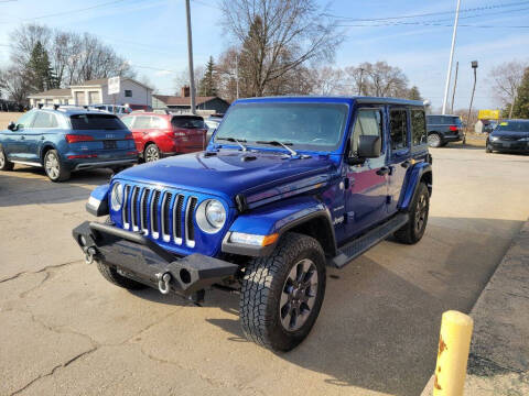 2018 Jeep Wrangler Unlimited for sale at Clare Auto Sales, Inc. in Clare MI