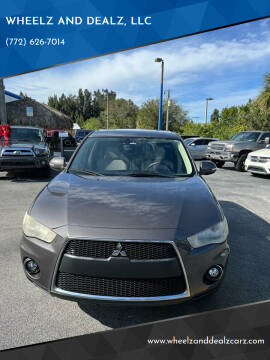 2011 Mitsubishi Outlander for sale at WHEELZ AND DEALZ, LLC in Fort Pierce FL