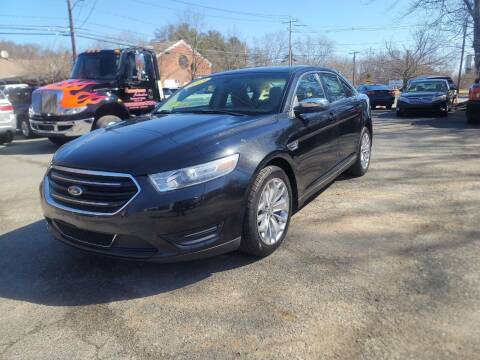 2013 Ford Taurus for sale at Hometown Automotive Service & Sales in Holliston MA
