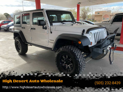 2013 Jeep Wrangler Unlimited for sale at High Desert Auto Wholesale in Albuquerque NM