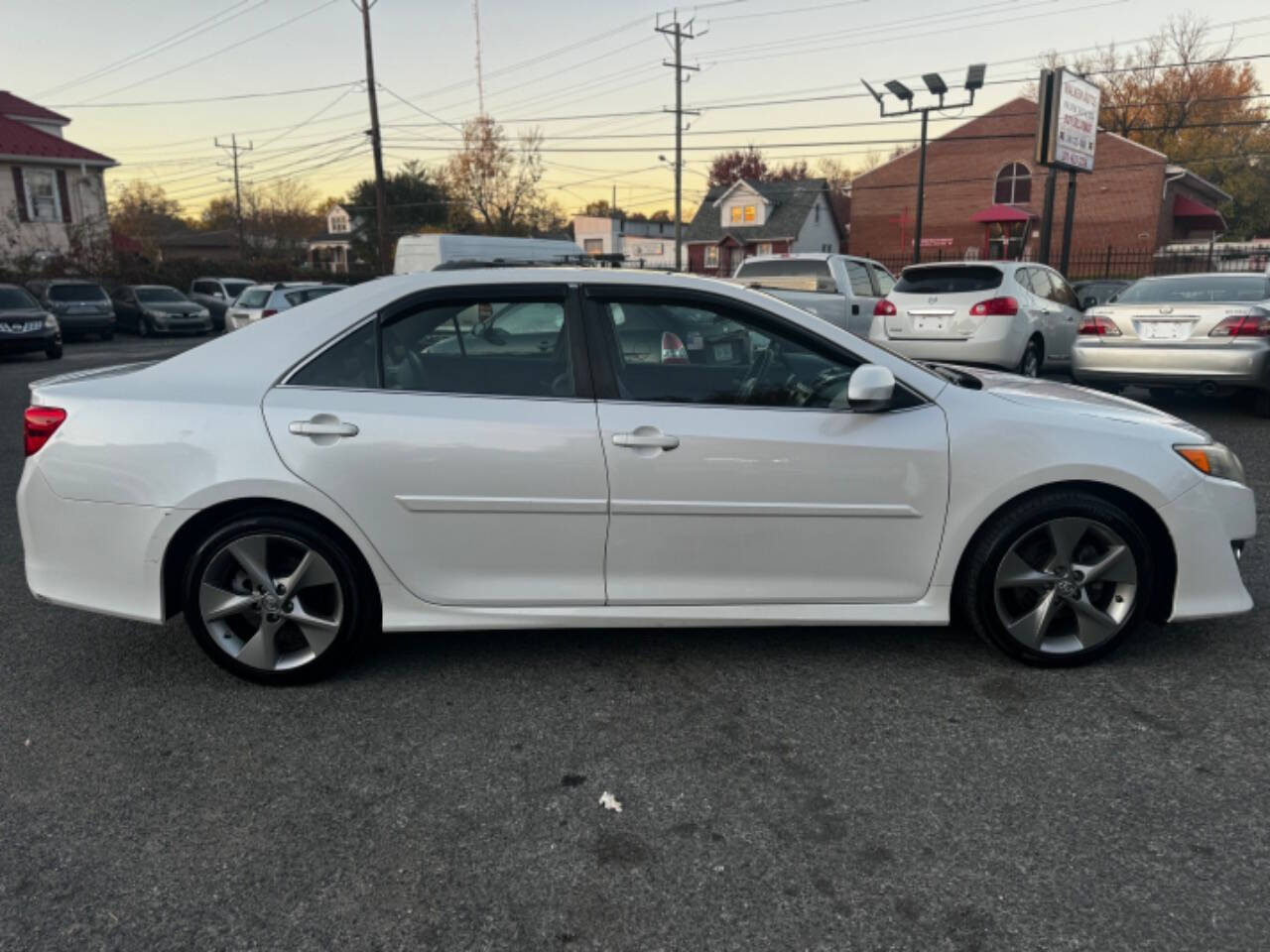 2014 Toyota Camry for sale at Walkem Autos in District Heights, MD