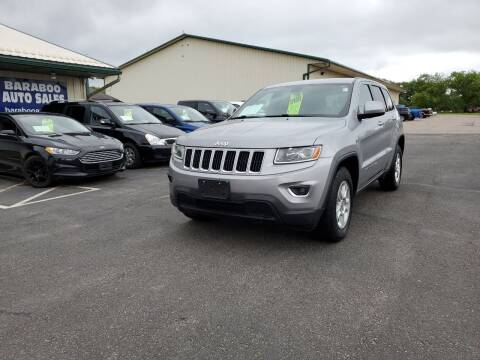 2014 Jeep Grand Cherokee for sale at Baraboo Auto Sales INC in Baraboo WI