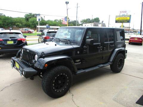 2014 Jeep Wrangler Unlimited for sale at Metroplex Motors Inc. in Houston TX