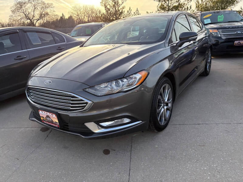 2017 Ford Fusion for sale at Azteca Auto Sales LLC in Des Moines IA