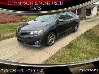 2014 Toyota Camry for sale at THOMPSON & SONS USED CARS in Marion OH