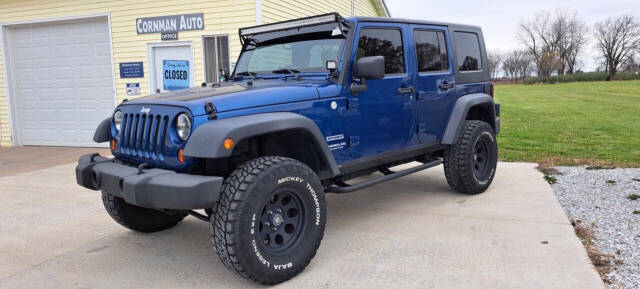 2010 Jeep Wrangler Unlimited for sale at CORNMAN AUTO LLC in Kirksville, MO