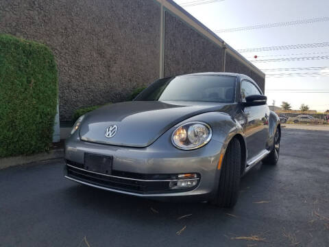 2012 Volkswagen Beetle for sale at Rynok Auto Sales LLC in Auburn WA