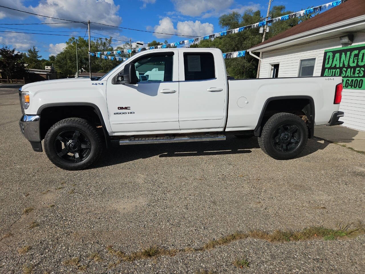 2015 GMC Sierra 2500HD for sale at DANGO AUTO SALES in HOWARD CITY, MI