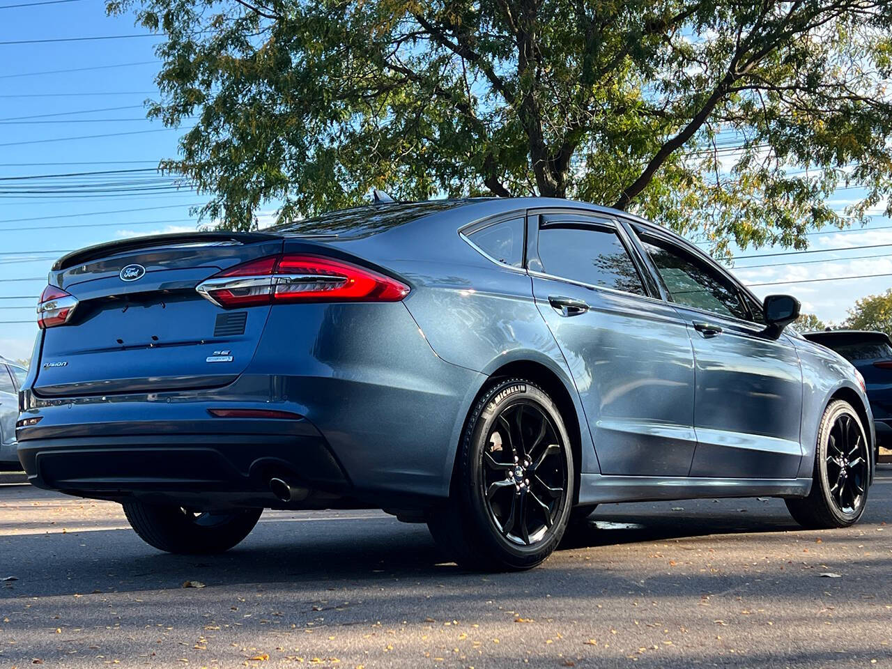 2019 Ford Fusion for sale at Spartan Elite Auto Group LLC in Lansing, MI