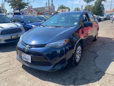 2018 Toyota Corolla for sale at Crown Auto Inc in South Gate CA