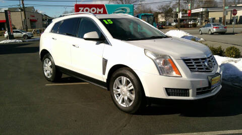 2015 Cadillac SRX for sale at MIRACLE AUTO SALES in Cranston RI