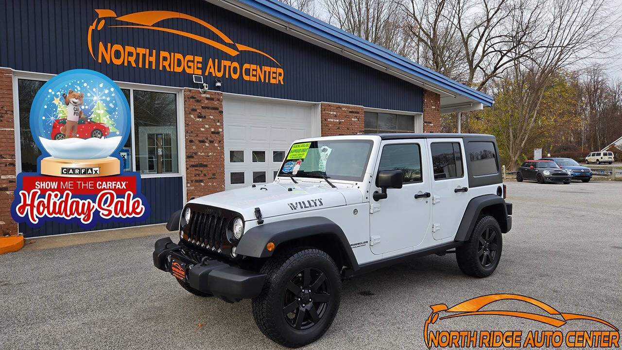 2017 Jeep Wrangler Unlimited for sale at North Ridge Auto Center LLC in Madison, OH