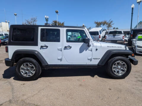2016 Jeep Wrangler Unlimited for sale at Convoy Motors LLC in National City CA