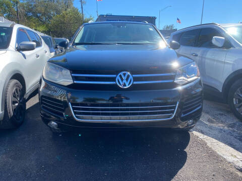 2013 Volkswagen Touareg for sale at America Auto Wholesale Inc in Miami FL