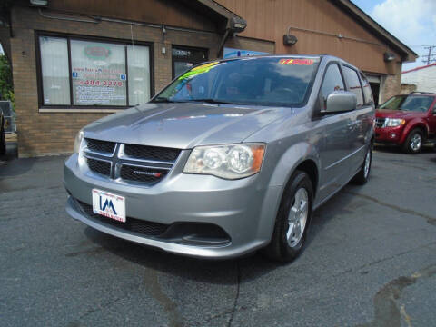 2013 Dodge Grand Caravan for sale at IBARRA MOTORS INC in Berwyn IL