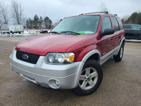 2006 Ford Escape Hybrid for sale at KOCUR KREW AUTO in Gladwin MI