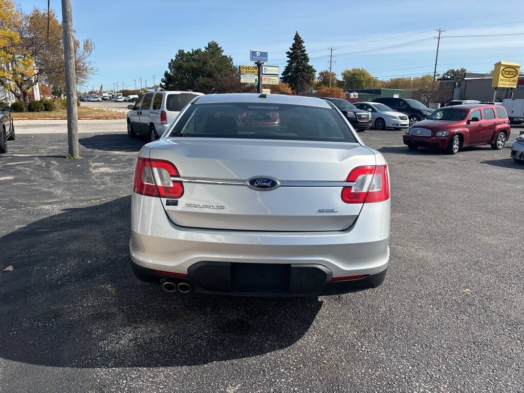 2010 Ford Taurus for sale at DECKER AUTO SALES in Bay City, MI