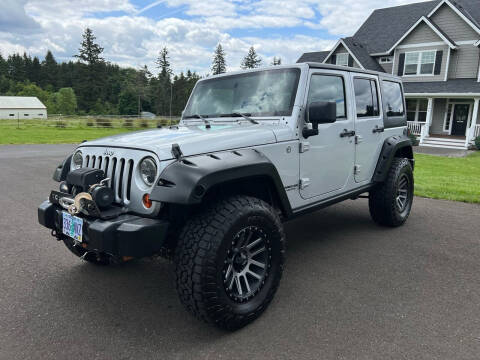 2012 Jeep Wrangler Unlimited for sale at Catuna Motor Company in Damascus OR