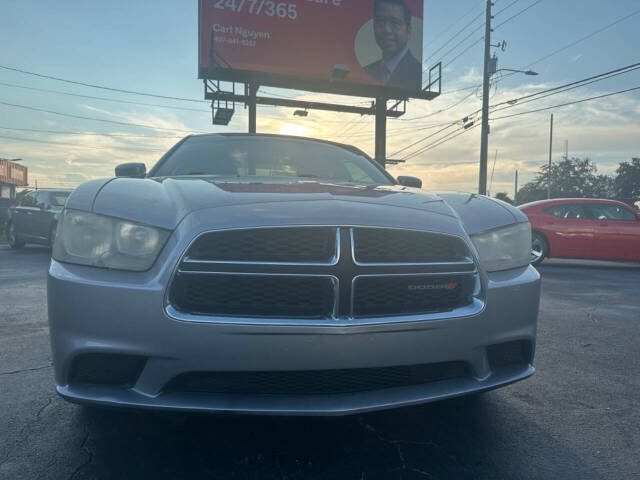 2013 Dodge Charger for sale at NOVA AUTO SALES in Orlando, FL